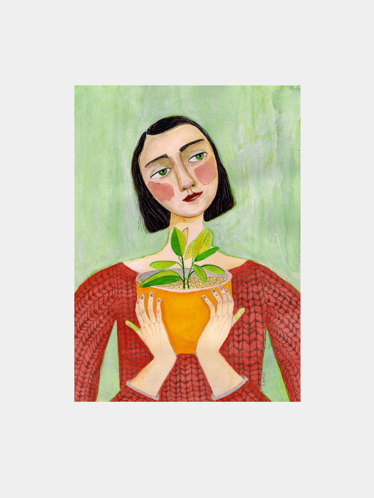 Woman Holding Green Plant