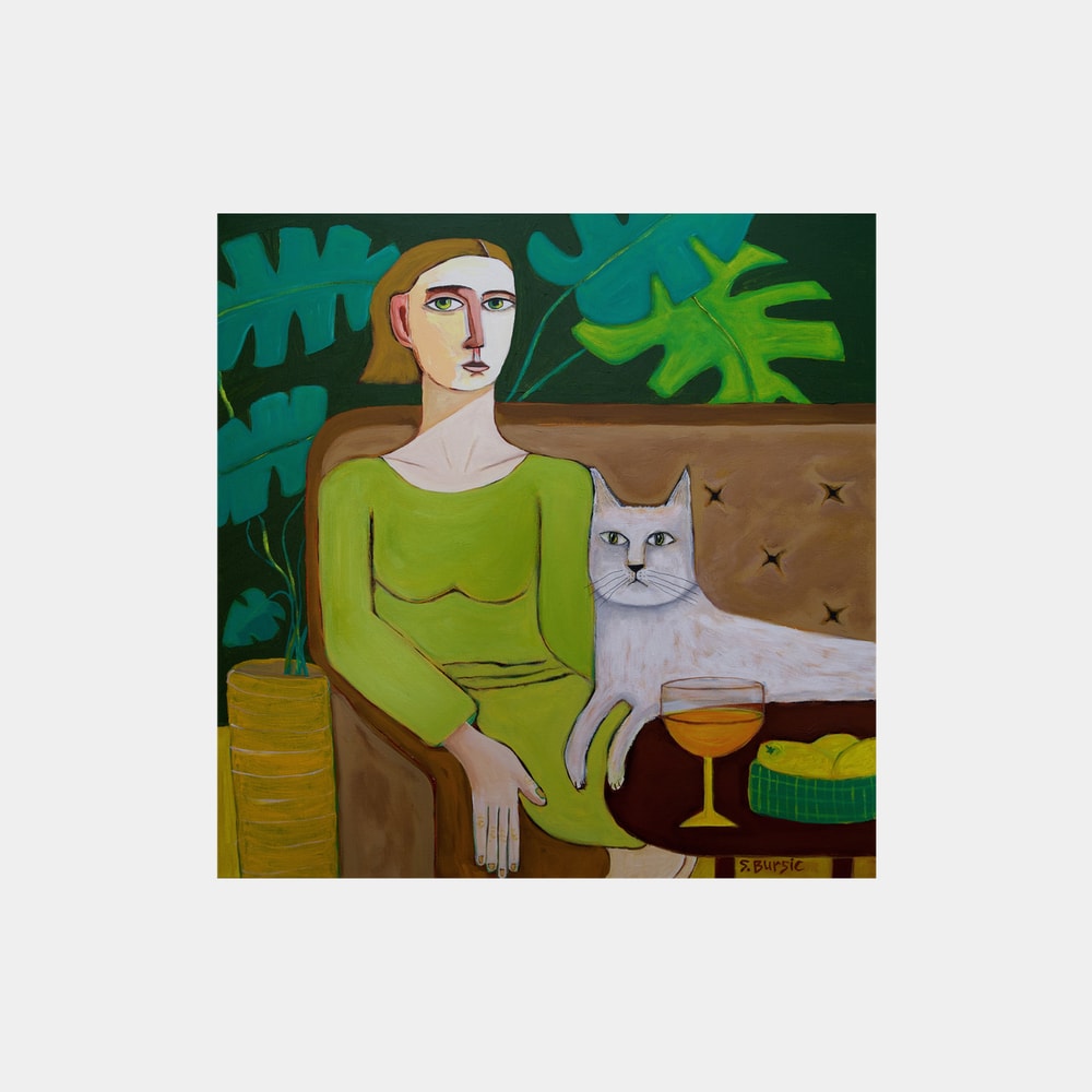 Woman Sitting with White Cat